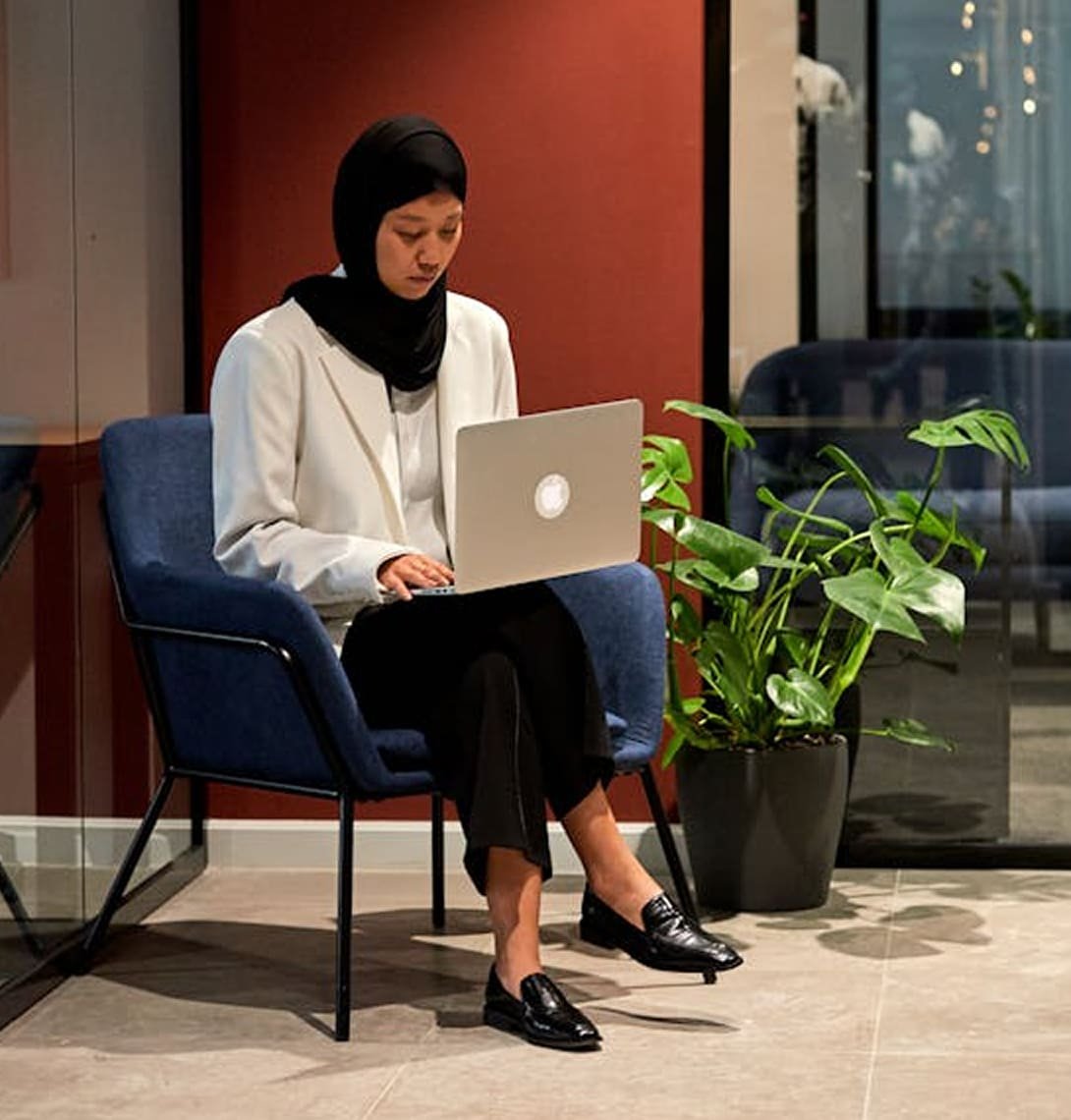 A distributed team member taking notes at a planning session